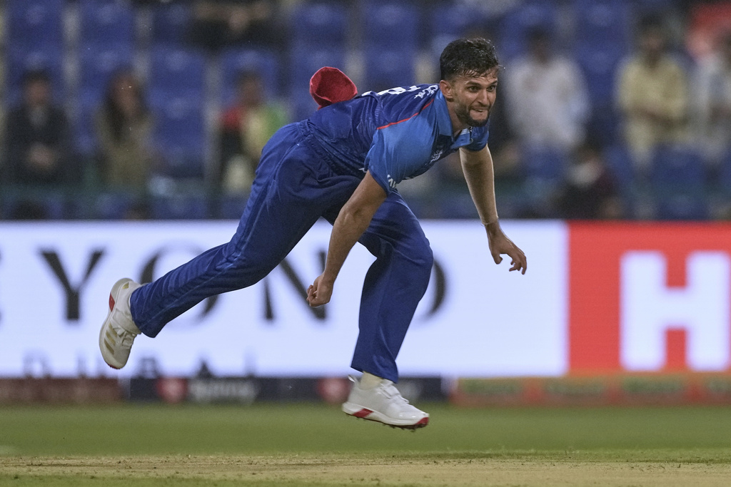Afghanistan's Azmatullah Omarzai bowls a delivery during the Asia Cup Cricket match between Afghanistan and Hong Kong at Zayed Cricket Stadium in Abu Dhabi, United Arab Emirates, Tuesday, Sept. 9, 2025. (AP Photo/Fatima Shbair)
