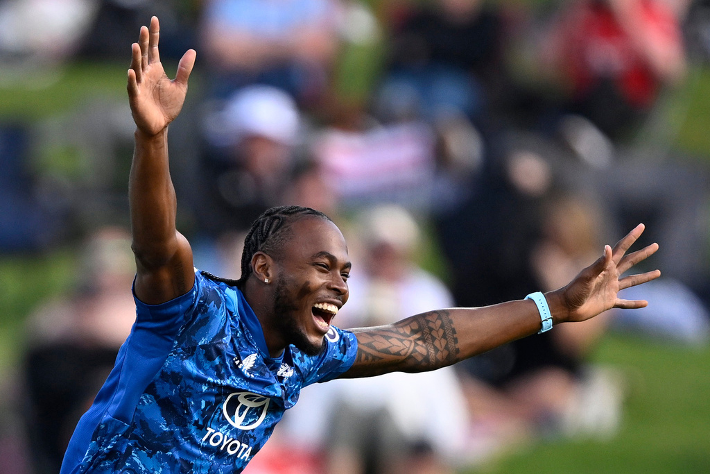 England's bowler Jofra Archer celebrates the wicket of New Zealand's Will Young during their T20 cricket match in Hamilton, New Zealand, Wednesday, Oct. 29, 2025. (Andrew Cornaga/Photosport via AP)