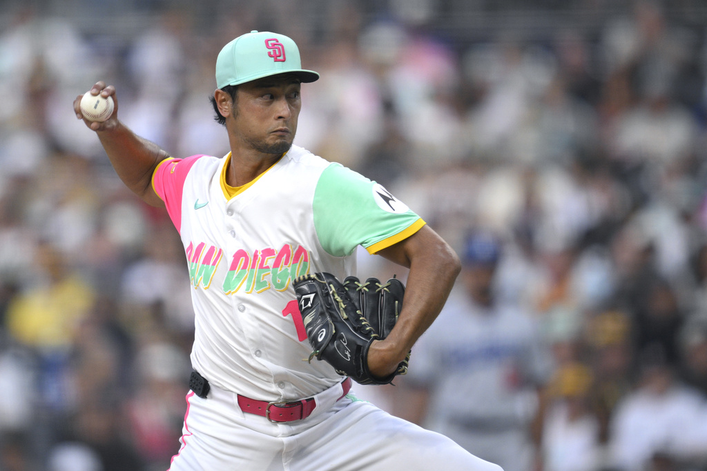 San Diego Padres starting pitcher Yu Darvish works against a Los Angeles Dodgers batter during the first inning of a baseball game Friday, Aug. 22, 2025, in San Diego. (AP Photo/Orlando Ramirez)