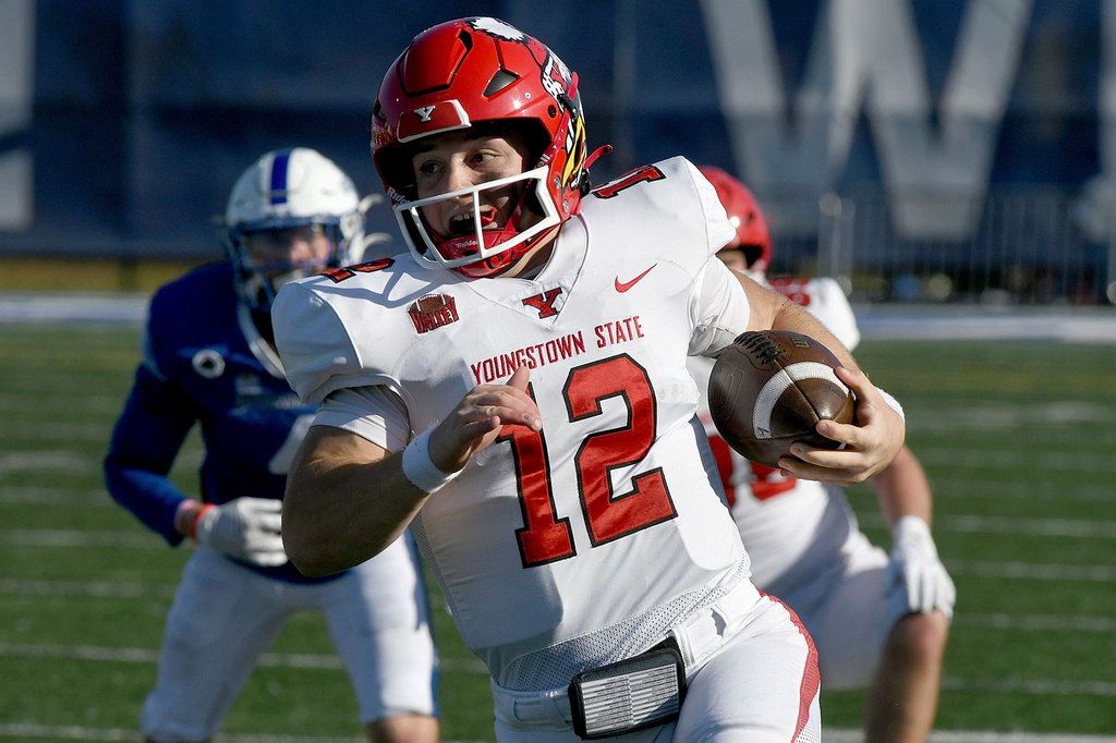 FILE - Youngstown State quarterback Beau Brungard runs through the Indiana State defense on his way to a touchdown during an NCAA college football game Nov. 4, 2023, in Terre Haute, Ind. (Joseph C. Garza/The Tribune-Star via AP, File)