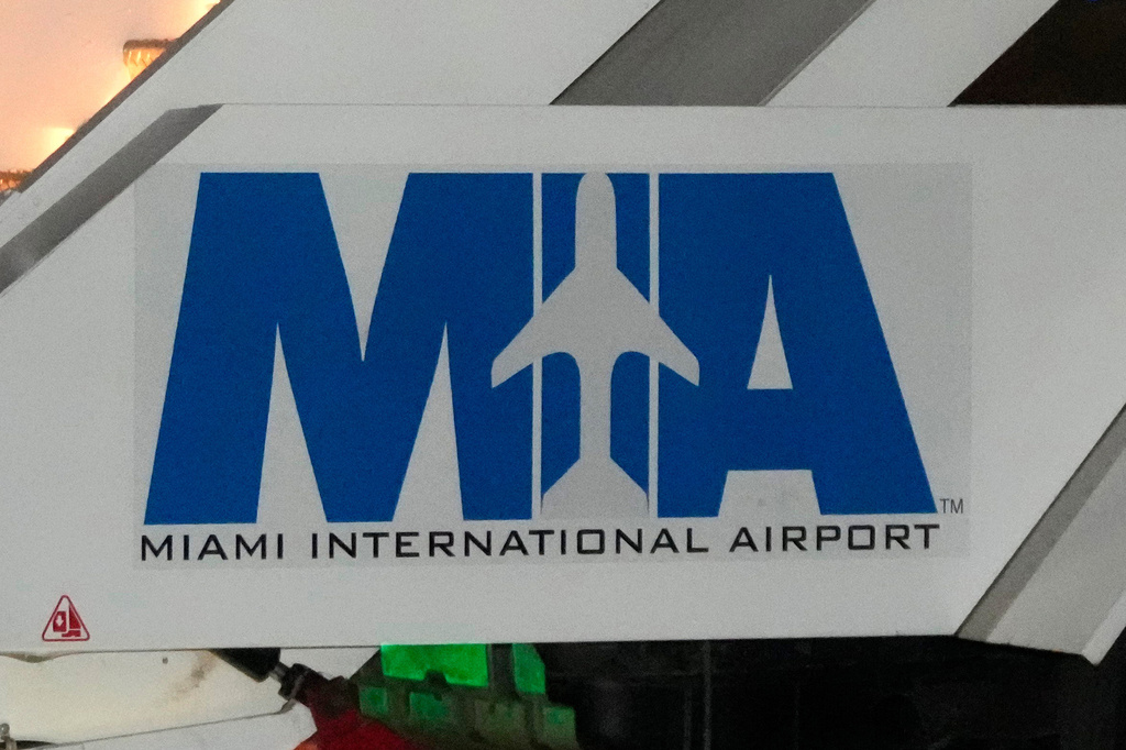 FILE - The logo of the Miami International Airport is seen on mobile boarding stairs in Miami on March 6, 2026. (AP Photo/Mark Schiefelbein, File)