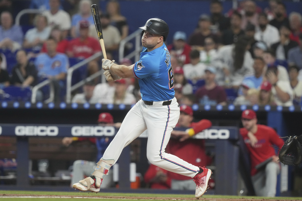 Miami Marlins' Jakob Marsee (87) hits a single during the first inning of a baseball game against the Philadelphia Phillies Sunday, Sept. 7, 2025, in Miami. (AP Photo/Marta Lavandier)