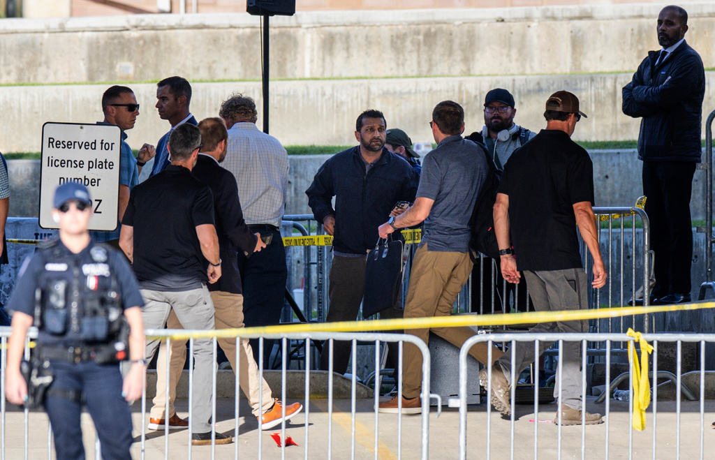 FBI Director Kash Patel, center, arrives at the scene of the shooting death of Charlie Kirk at Utah Valley University in Orem, Utah, on Thursday, Sept. 11, 2025. (Rio Giancarlo/The Deseret News via AP)