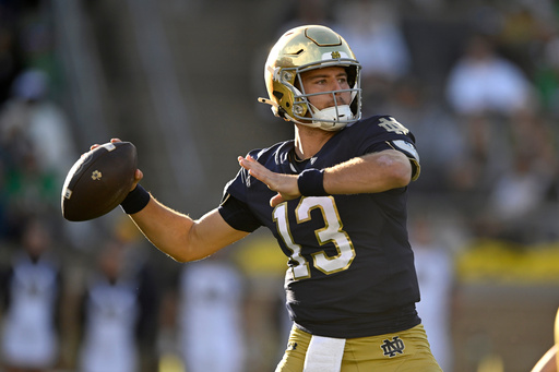 Notre Dame quarterback CJ Carr looks to throw during the third quarter of an NCAA college football game against North Carolina State, Saturday, Oct. 11, 2025, in South Bend, Ind. (AP Photo/Paul Beaty) Notre Dame quarterback CJ Carr looks to throw during the third quarter of an NCAA college football game against North Carolina State, Saturday, Oct. 11, 2025, in South Bend, Ind. (AP Photo/Paul Beaty)