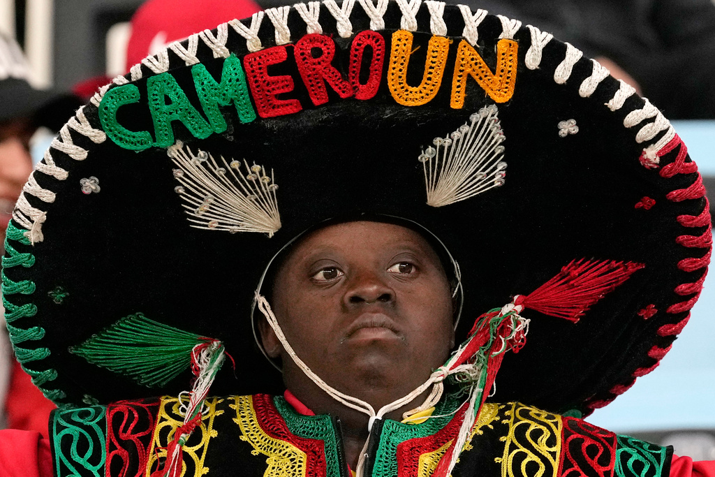A Cameroon fan looks sceptical ahead of the Africa Cup of Nations round of 16 soccer match between South Africa and Cameroon in Rabat, Morocco, Sunday, Jan. 4, 2026. (AP Photo/Themba Hadebe)