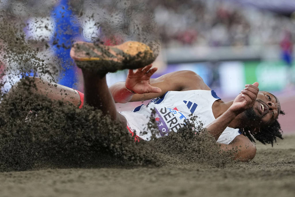 France's Jonathan Seremes competes in the men's triple jump final at the World Athletics Championships in Tokyo, Friday, Sept. 19, 2025. (AP Photo/Ashley Landis)