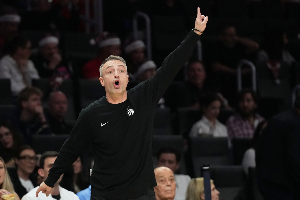 Toronto Raptors head coach Darko Rajakovic reacts during the first half of an NBA basketball game against the Miami Heat, Tuesday, Dec. 23, 2025, in Miami. (AP Photo/Lynne Sladky)