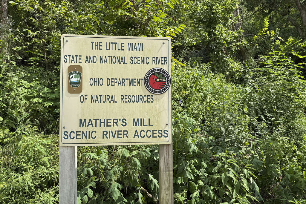 A sign for the Ohio Department of Natural Resources is seen along the Little Miami River, Thursday, Aug. 7, 2025, in Oregonia, Ohio. (AP Photo/Patrick Aftoora-Orsagos)