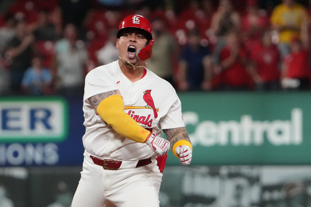 St. Louis Cardinals' Yohel Pozo celebrates after hitting an RBI double during the ninth inning of a baseball game against the Cleveland Guardians Tuesday, April 14, 2026, in St. Louis. (AP Photo/Jeff Roberson)