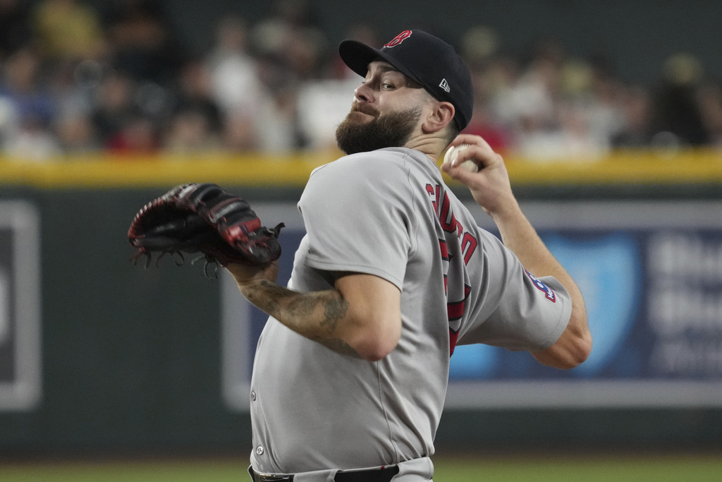 CORRECTS TO SATURDAY INSTEAD OF SUNDAY - Boston Red Sox pitcher Lucas Giolito throws against the Arizona Diamondbacks in the first inning of a baseball game, Saturday, Sept 6, 2025, in Phoenix. (AP Photo/Rick Scuteri)