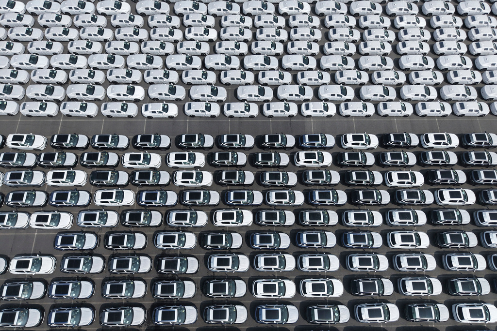 Aerial view of new vehicles waiting for shipment to overseas market at a port in Shanghai, China Saturday, May 9, 2026. (Chinatopix via AP)