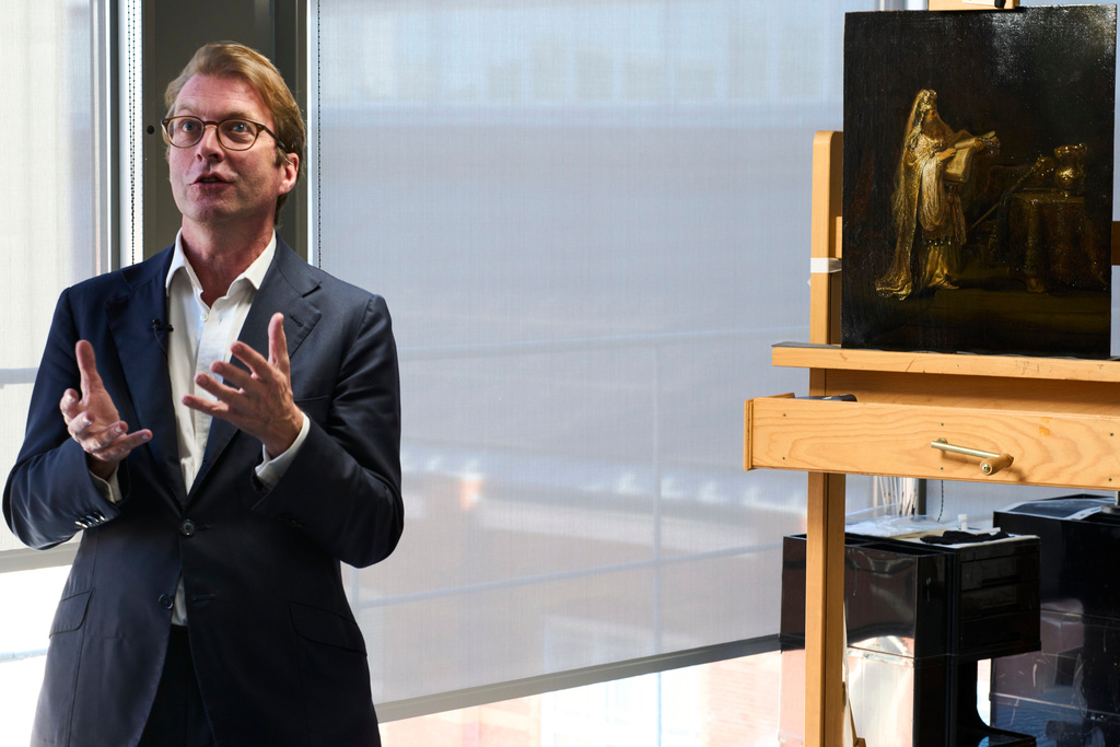 Director Taco Dibbits of the Rijksmuseum unveiled the work "Vision of Zacharias in the Temple" during a press preview in Amsterdam, Netherlands, Monday, March 2, 2026 and said two years of analysis has confirmed it was painted by Rembrandt. (AP Photo/Peter Dejong)