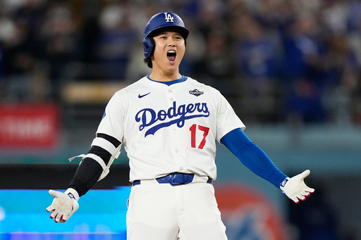 Los Angeles Dodgers' Shohei Ohtani celebrates hit RBI-Double against the Toronto Blue Jays during the fifth inning in Game 3 of baseball's World Series, Monday, Oct. 27, 2025, in Los Angeles. (AP Photo/Brynn Anderson) Los Angeles Dodgers' Shohei Ohtani celebrates hit RBI-Double against the Toronto Blue Jays during the fifth inning in Game 3 of baseball's World Series, Monday, Oct. 27, 2025, in Los Angeles. (AP Photo/Brynn Anderson)