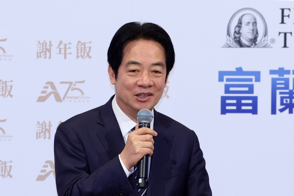 Taiwan President Lai Ching-te delivers a speech during the 2026 Hsieh Nien Fan annual dinner of the American Chamber of Commerce in Taipei, Taiwan, Thursday, March 26, 2026. (AP Photo/Chiang Ying-ying)