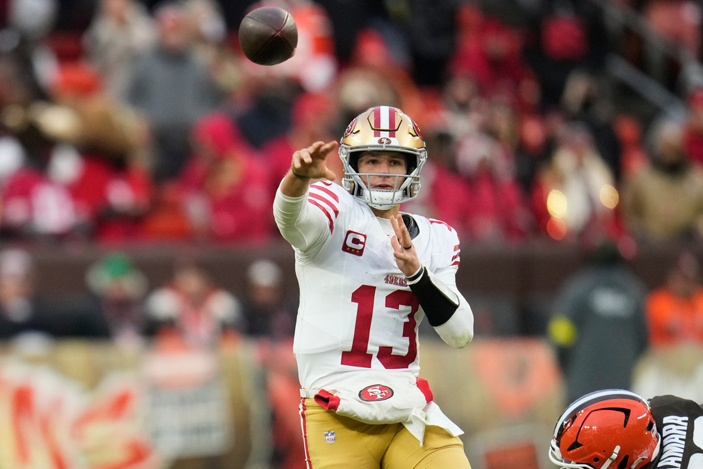 San Francisco 49ers quarterback Brock Purdy (13) passes against the Cleveland Browns during the second half of an NFL football game, Sunday, Nov. 30, 2025, in Cleveland. (AP Photo/Sue Ogrocki)