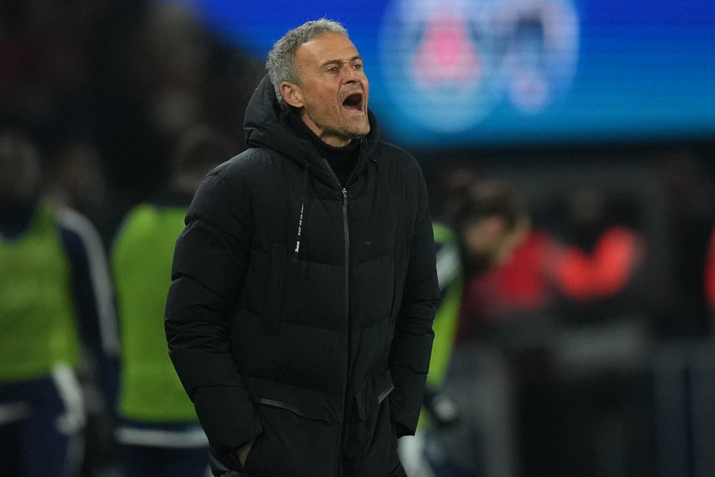 PSG's head coach Luis Enrique gives instructions during the French Ligue 1 soccer match between Paris Saint-Germain and Paris FC in Paris, Sunday, Jan. 4, 2026. (AP Photo/Christophe Ena)