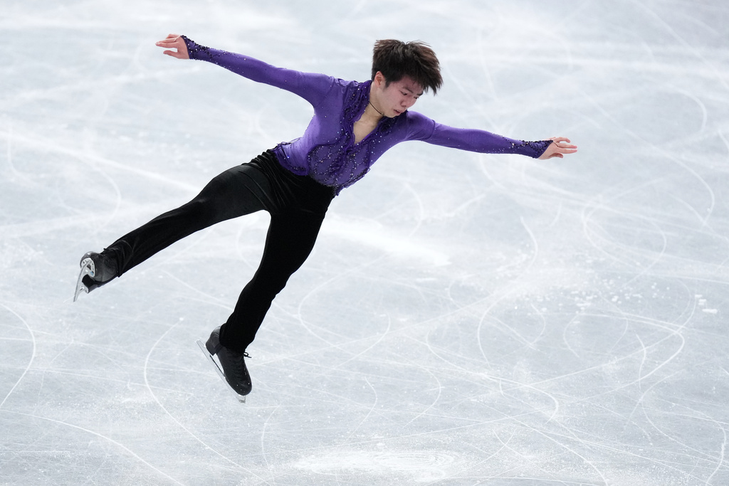 Shun Sato, of Japan, competes in the men's short program segment at the ISU Grand Prix of Figure Skating Final in Nagoya, central Japan, Thursday, Dec. 4, 2025. (AP Photo/Hiro Komae)