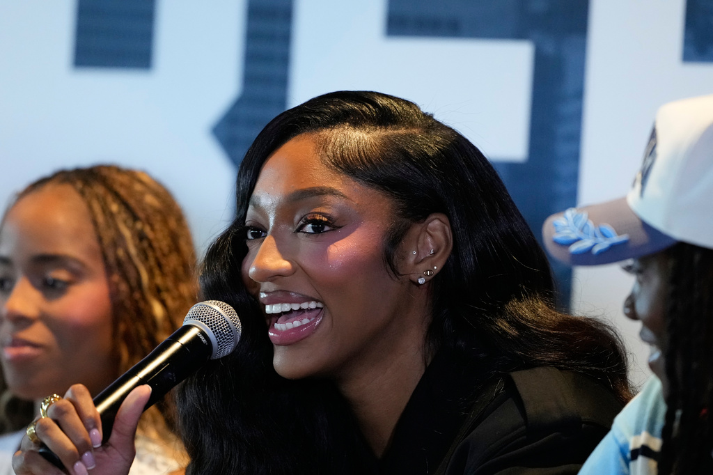 Angel Reese speaks during her introduction during a news conference by the Atlanta Dream on Friday, April 17, 2026, in Atlanta. The Dream acquired Reese for first-round draft picks in 2027 and 2028. (AP Photo/Brynn Anderson)