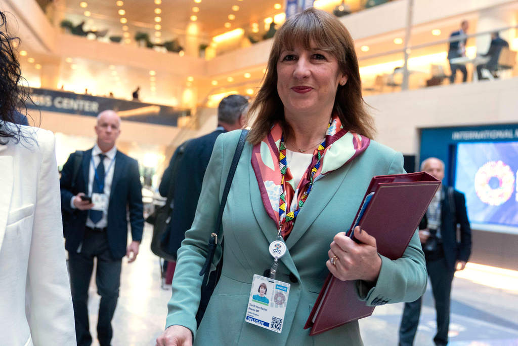 Britain's Chancellor of the Exchequer Rachel Reeves walks to the G20 meeting during the World Bank/IMF Annual Meetings at the International Monetary Fund (IMF) headquarters in Washington, Thursday, Oct. 16, 2025. (AP Photo/Jose Luis Magana)