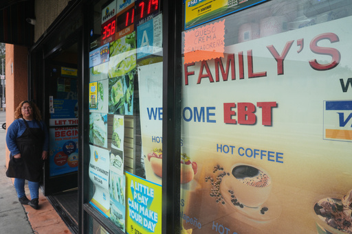 A sign indicates EBT cards are accepted at a market on Monday, Oct. 27, 2025, in Los Angeles. (AP Photo/Damian Dovarganes) A sign indicates EBT cards are accepted at a market on Monday, Oct. 27, 2025, in Los Angeles. (AP Photo/Damian Dovarganes)