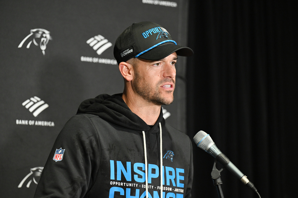 Carolina Panthers head coach Dave Canales answers questions after an NFL football game against the Tampa Bay Buccaneers Saturday, Jan. 3, 2026, in Tampa, Fla. (AP Photo/Jason Behnken)