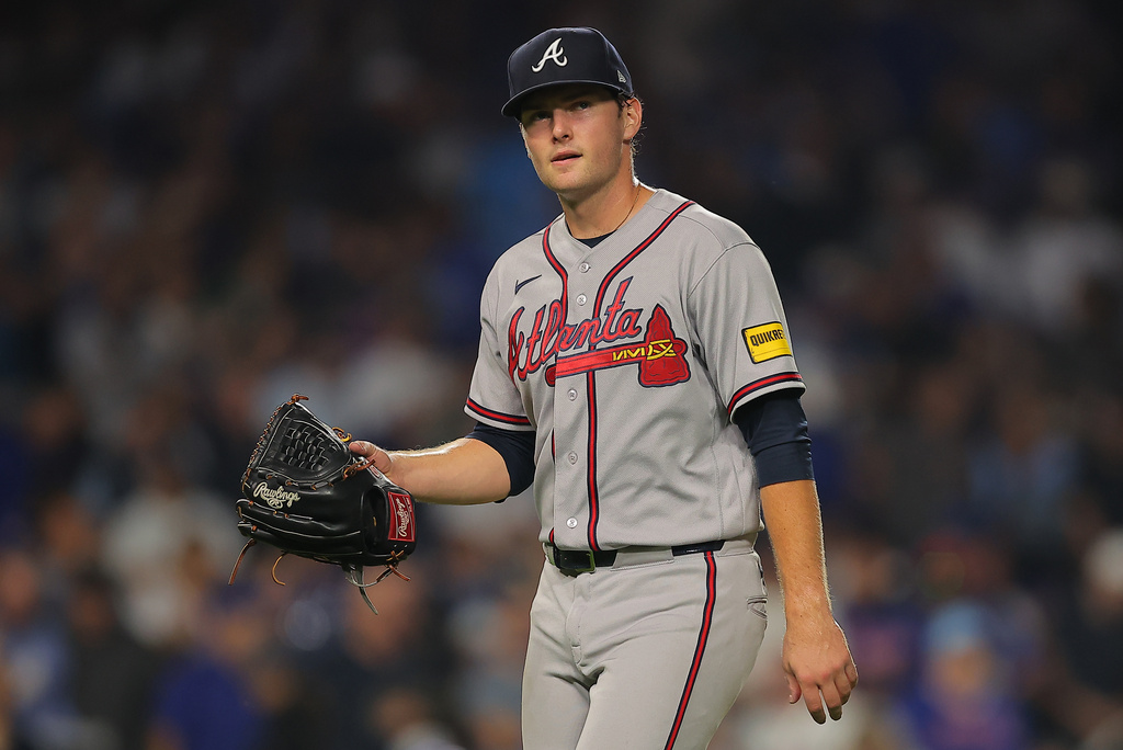 Atlanta Braves' JR Ritchie walks back to the dugout after being taken out during the fifth inning of a baseball game against the Chicago Cubs, Wednesday, Sept. 16, 2026, in Chicago. (AP Photo/Melissa Tamez)