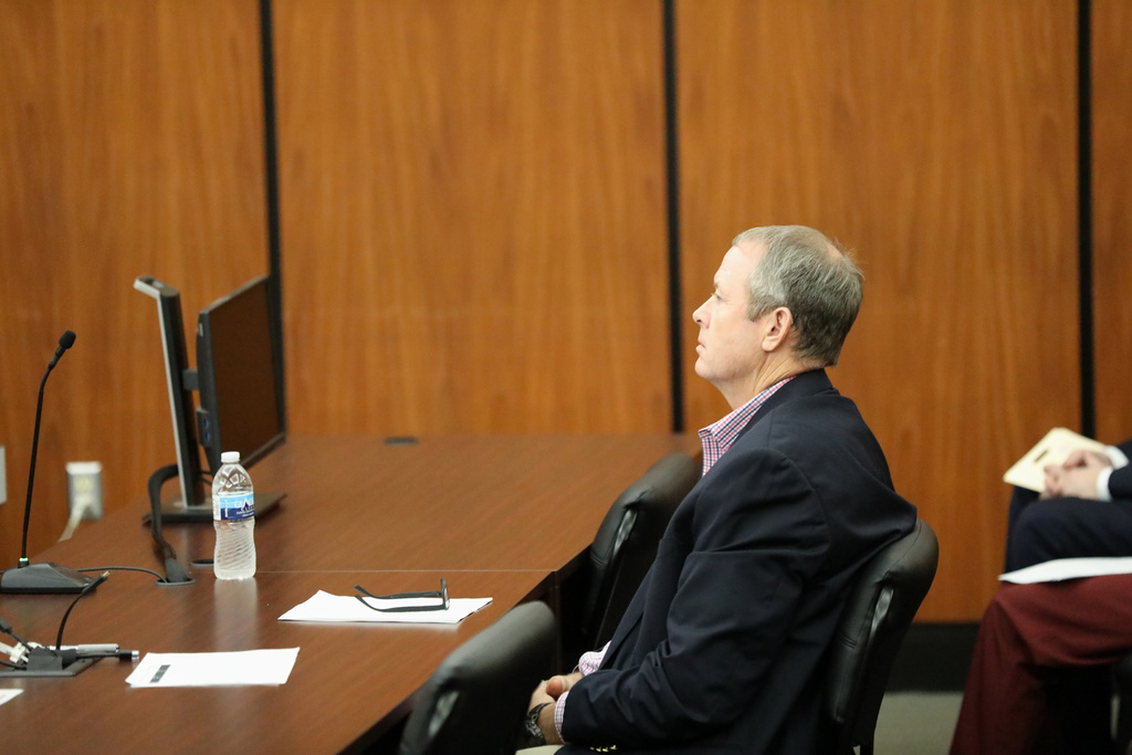 Russell Laffitte waits to plead guilty in state court to bank fraud charges for his role in helping Alex Murdaugh steal money, Thursday, Sept. 25, 2025, in Columbia, S.C. (AP Photo/Jeffrey Collins)