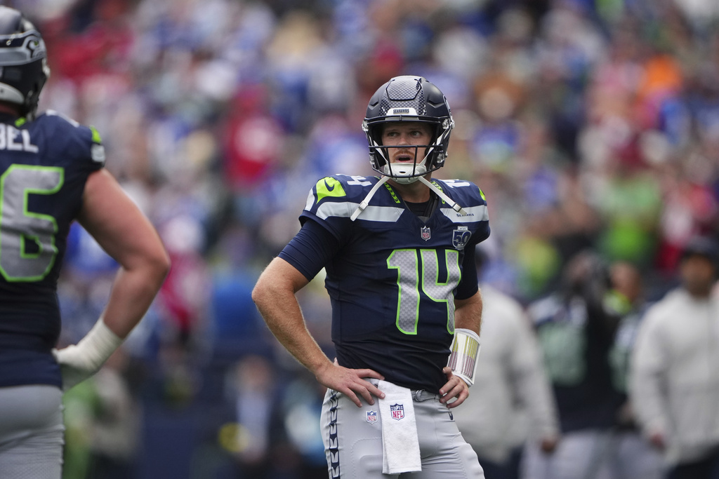 Seattle Seahawks quarterback Sam Darnold (14) looks on during the second half of an NFL football game against the San Francisco 49ers, Sunday, Sept. 7, 2025, in Seattle. (AP Photo/Lindsey Wasson)
