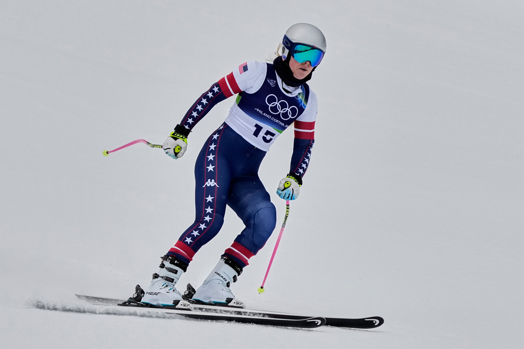 United States' Lindsey Vonn arrives at the finish area of an alpine ski women's downhill training, at the 2026 Winter Olympics, in Cortina d'Ampezzo, Italy, Saturday, Feb. 7, 2026. (AP Photo/Andy Wong)