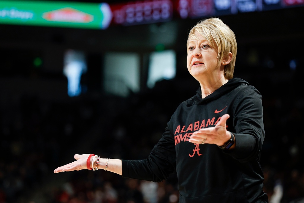Alabama head coach Kristy Curry argues a call during the first half of an NCAA college basketball game against South Carolina in Columbia, S.C., Thursday, Jan. 1, 2026. (AP Photo/Nell Redmond)
