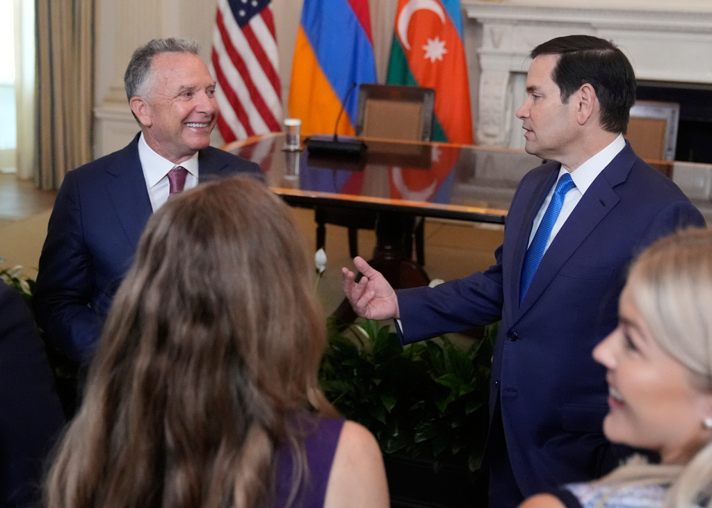 FILE - Special Presidential Envoy Steve Witkoff, left, and Secretary of State Marco Rubio arrive before a trilateral signing ceremony with Azerbaijan's President Ilham Aliyev and Armenia's Prime Minister Nikol Pashinyan in the State Dining Room of the White House, Aug. 8, 2025, in Washington. (AP Photo/Mark Schiefelbein, File)