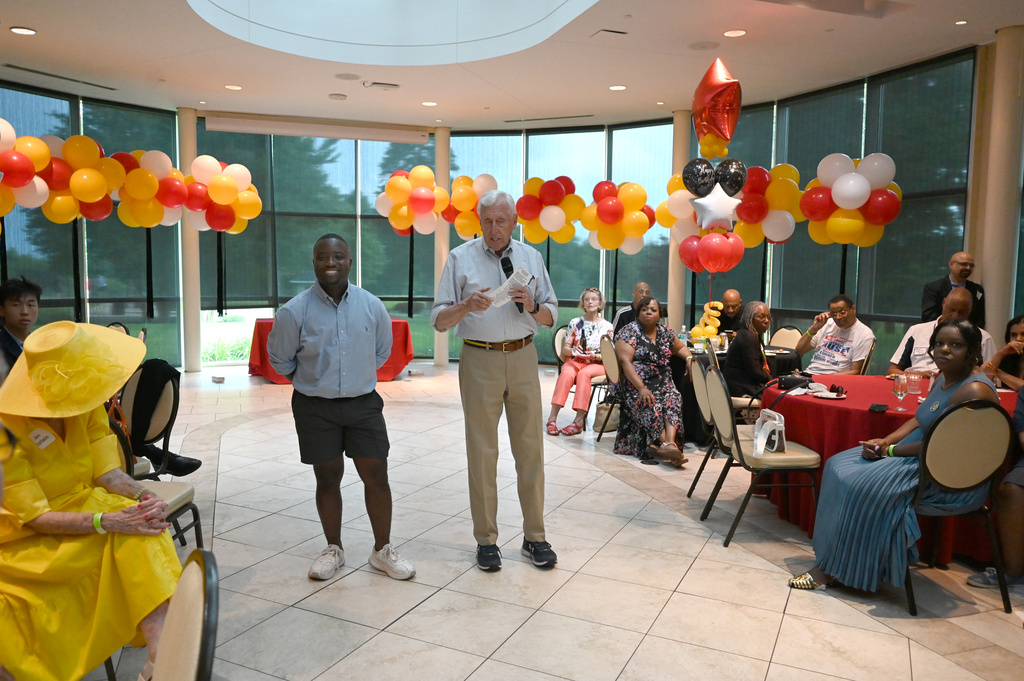 Adrian Boafo, left, a Maryland state delegate and candidate for U.S. Congress stands with U.S. Representative Steny Hoyer at the "AmeriPac Bull Roast" Friday, June 12, 2026, in Mitchellville, Md. (AP Photo/Gail Burton)