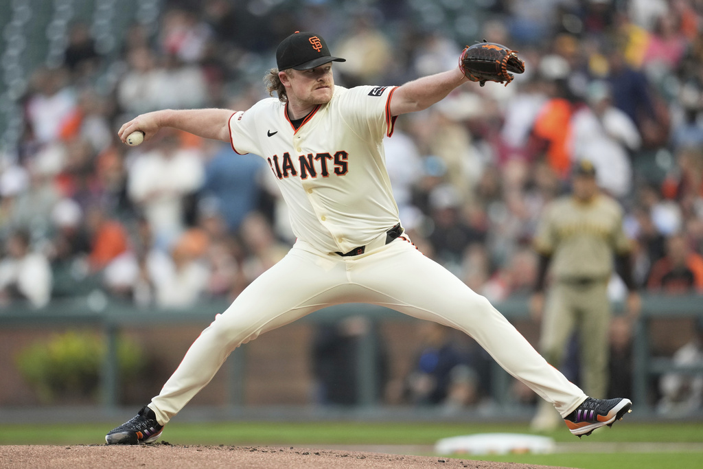 San Francisco Giants pitcher Logan Webb throws against the San Diego Padres during the first inning of a baseball game in San Francisco, Monday, Aug. 11, 2025. (AP Photo/Jeff Chiu)