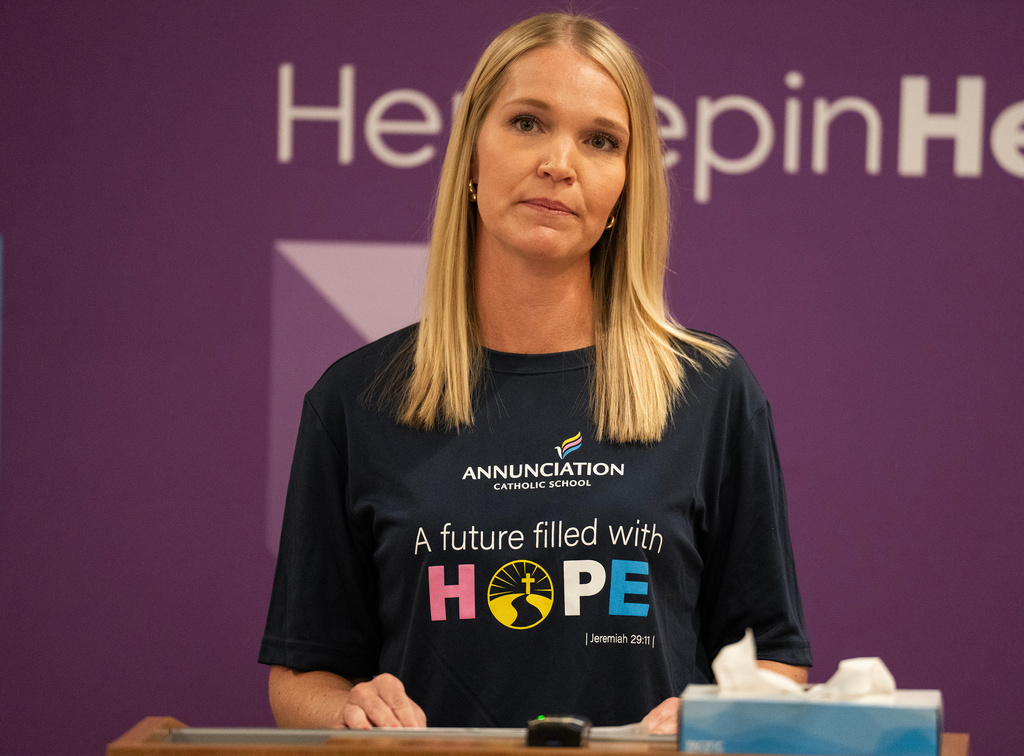 Malia Kimbrell, a nurse and mother, reads a statement about the recovery of her daughter, Vivian St. Clair, on Thursday, Sept. 4, 2025, after she was injured in the Aug. 27, Annunciation Church shooting in Minneapolis, Minn. (Richard Tsong-Taatarii/Star Tribune via AP)