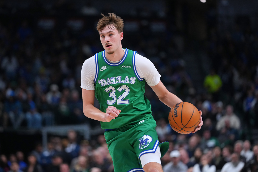 Dallas Mavericks forward Cooper Flagg drives to the basket against the Brooklyn Nets during the first half of an NBA basketball game Monday, Jan. 12, 2026, in Dallas. (AP Photo/Julio Cortez)