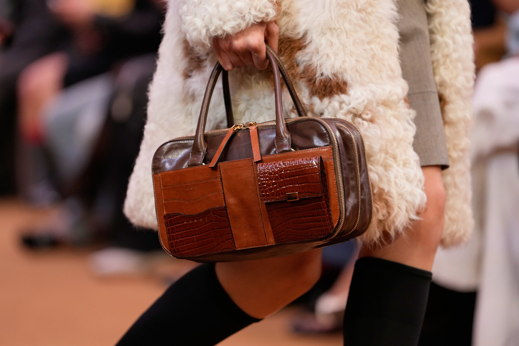 A model wears a creation from the Marni Fall/Winter 2026-2027 Women's collection presented in Milan, Italy, Thursday, Feb. 26, 2026. (AP Photo/Luca Bruno)