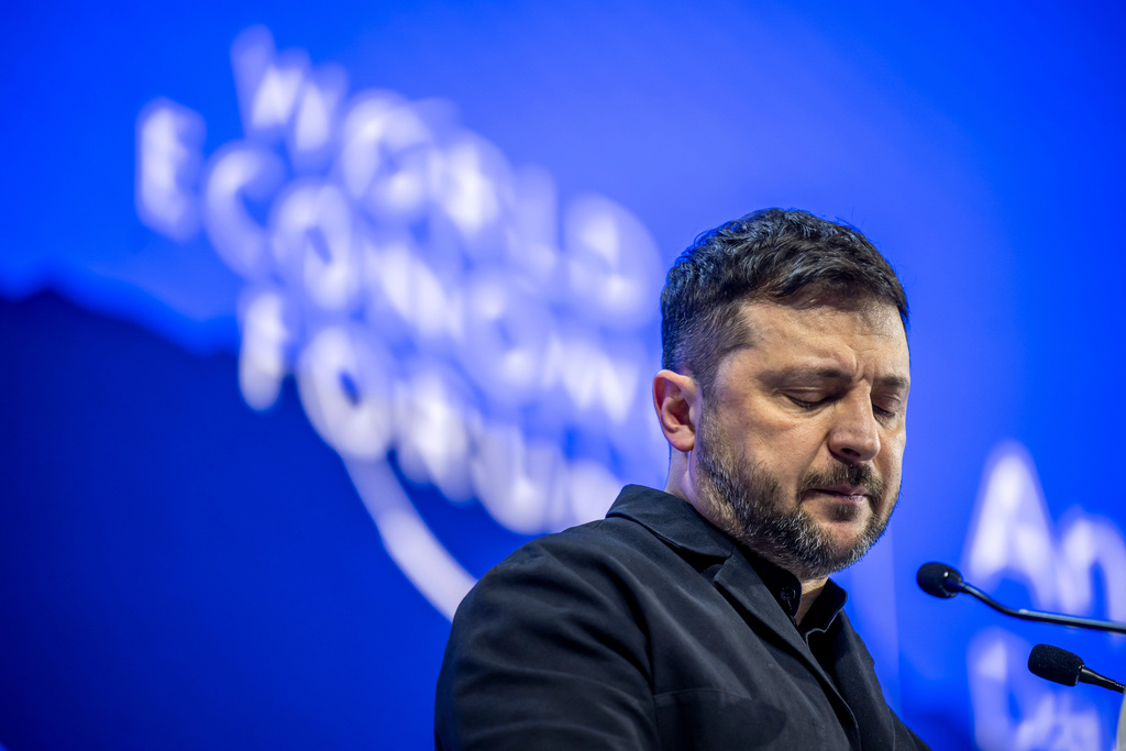 Ukraine's President Volodymyr Zelenskyy pauses as he delivers a speech at the Annual Meeting of the World Economic Forum in Davos, Switzerland, Thursday, Jan. 22, 2026. (Gian Ehrenzeller/Keystone via AP)