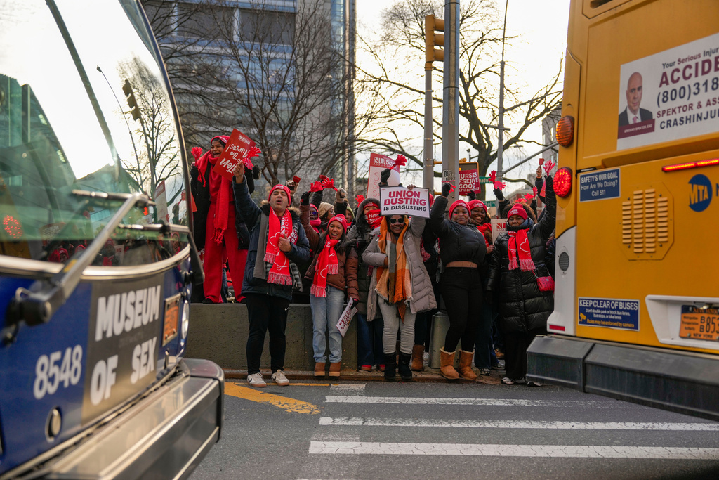 Nurses strike outside New York-Presbyterian Hospital, Monday, Jan. 12, 2026, in New York. (AP Photo/Yuki Iwamura)