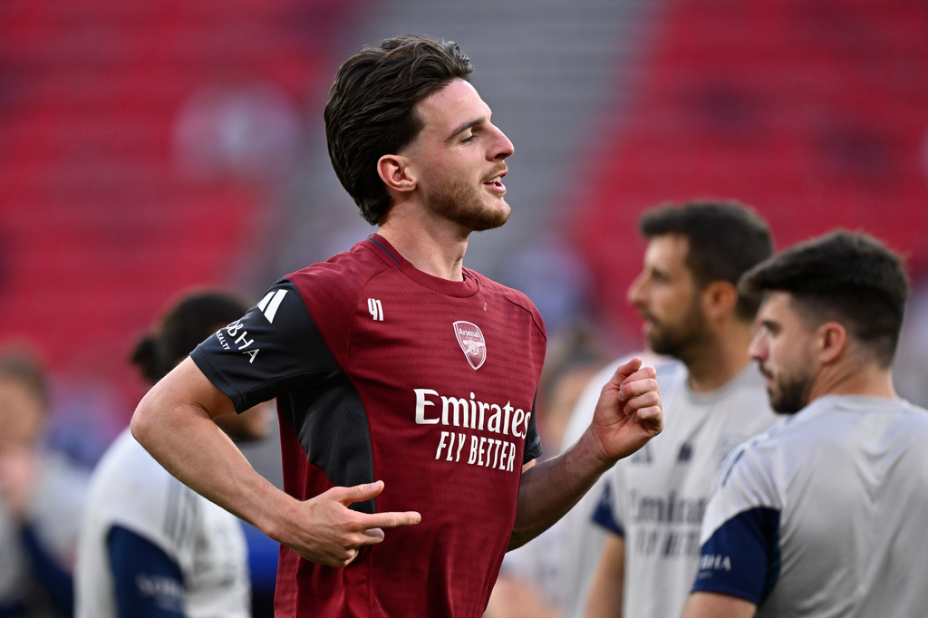 Arsenal's Declan Rice warms up during a training session ahead of the Champions League final soccer match between Paris Saint-Germain and Arsenal in Budapest, Hungary, Friday, May 29, 2026. (AP Photo/Denes Erdos)