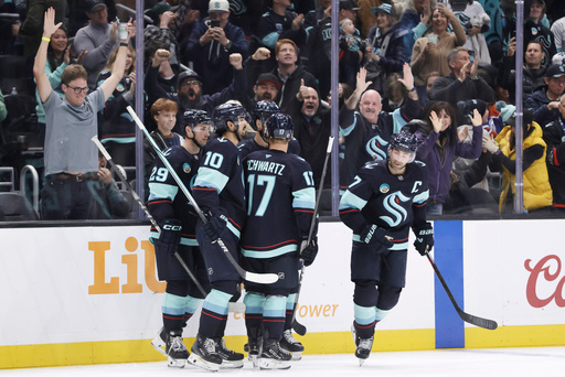 Seattle Kraken right wing Jordan Eberle (7) celebrates his goal with teammates against the Edmonton Oilers in the third period of an NHL hockey game Saturday, Oct. 25, 2025, in Seattle. (AP Photo/John Froschauer) Seattle Kraken right wing Jordan Eberle (7) celebrates his goal with teammates against the Edmonton Oilers in the third period of an NHL hockey game Saturday, Oct. 25, 2025, in Seattle. (AP Photo/John Froschauer)