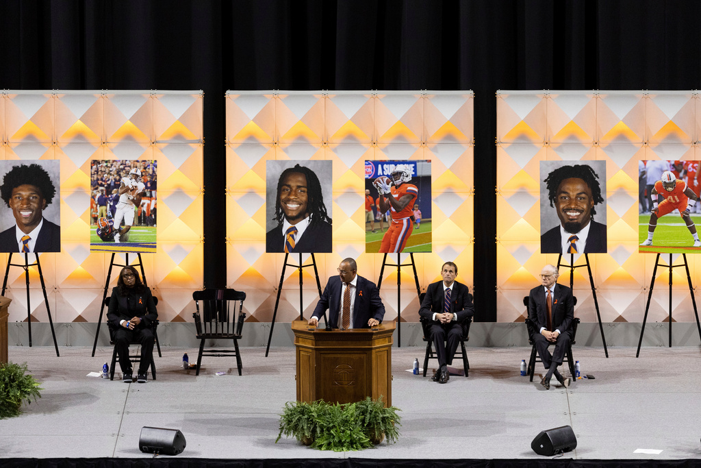 FILE - University of Virginia head football coach Tony Elliott speaks at a memorial service for three football players that were fatally shot, in Charlottesville, Va., Nov. 19, 2022. (Mike Kropf/The Daily Progress via AP, File)