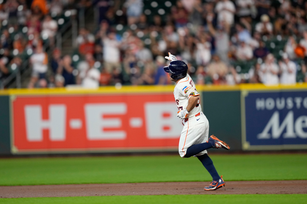 Houston Astros' Jose Altuve celebrates after hitting a two-run home run against the Chicago White Sox during the first inning of a baseball game Thursday, Sept. 3, 2026, in Houston. (AP Photo/David J. Phillip)