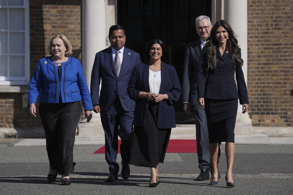 From left, New Zealand's Minister Judith Collins, Canada Minister of Public Safety Gary Anandasangaree, Britain's Home Secretary Shabana Mahmood, Australia Minister for Home Affairs Tony Burke and United States Homeland Security Secretary Kristi Noem arrive for a family photo during the Five Country Ministerial meeting at the Honourable Artillery Company in London, Monday, Sept. 8, 2025 as interior ministers of the UK, US, Canada, Australia and New Zealand will discuss some of the major security threats facing our nations. (AP Photo/Kin Cheung)