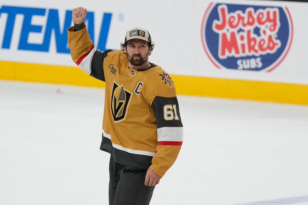 Vegas Golden Knights right wing Mark Stone (61) celebrates after winning Game 4 of the Western Conference finals NHL hockey Stanley Cup playoff series against the Colorado Avalanche Tuesday, May 26, 2026, in Las Vegas. (AP Photo/John Locher)