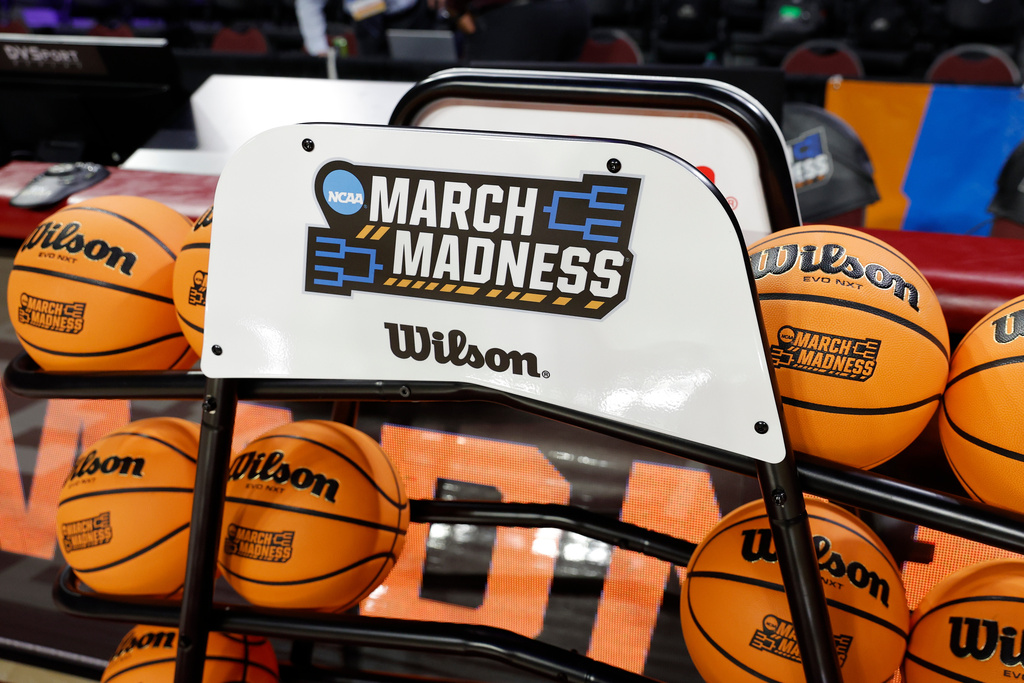 March Madness signage is displayed before a game between Colorado State and Michigan State in the first round of the NCAA college basketball tournament, Friday, March 20, 2026, Norman, Okla. (AP Photo/Alonzo Adams)