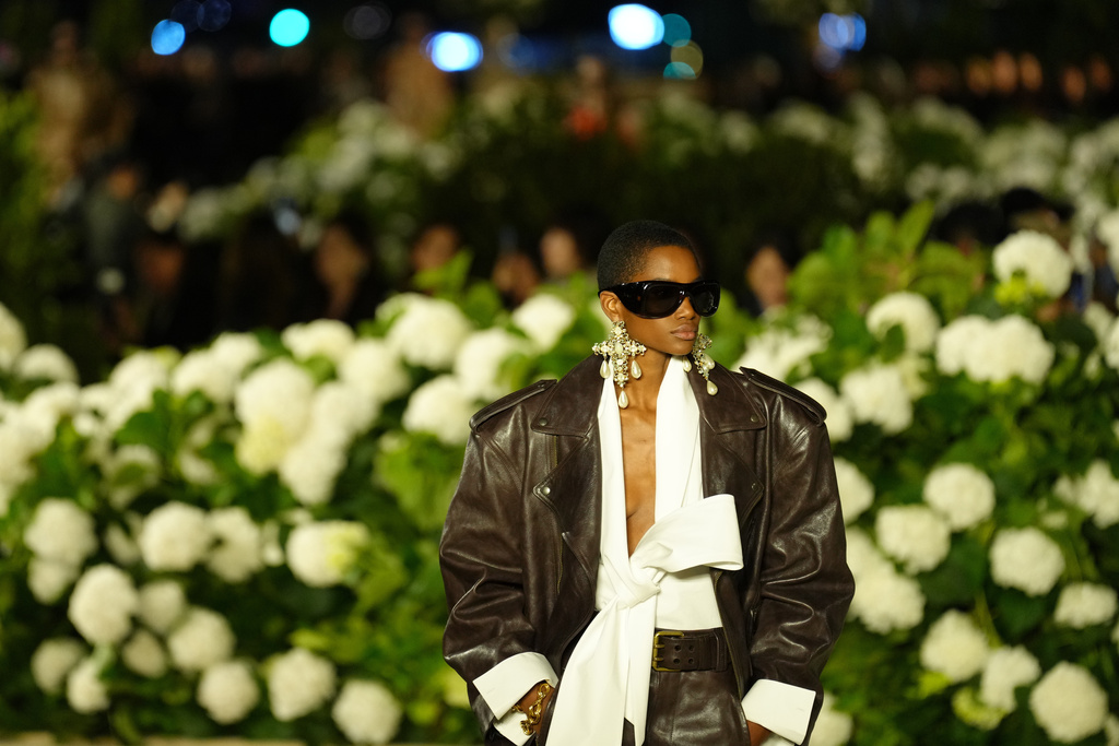 FILE - A model wears a creation as part of the Saint Laurent Spring/Summer 2026 collection presented in Paris, Monday, Sept. 29, 2025. (AP Photo/Aurelien Morissard, File)