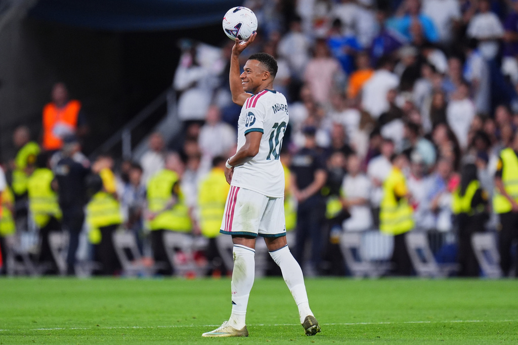 Real Madrid's Kylian Mbappe celebrates after scoring during the La Liga soccer match between Real Madrid and Real Sociedad in Madrid, Spain, Wednesday, Aug. 26, 2026. (AP Photo/Manu Fernandez)