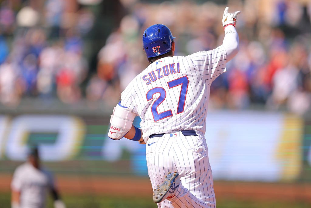 Chicago Cubs' Seiya Suzuki celebrates his home run during the fifth inning of a baseball game against the Miami Marlins, Thursday , Sept. 24, 2026, in Chicago. (AP Photo/Melissa Tamez)