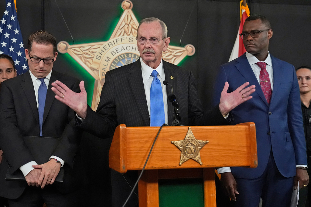 FILE - Palm Beach County Sherriff Ric Bradshaw, center, speaks during a news conference by law enforcement officials, Monday, Sept. 16, 2024, at the Palm Beach County Sheriff's Office in West Palm Beach, Fla.. (AP Photo/Wilfredo Lee, File)