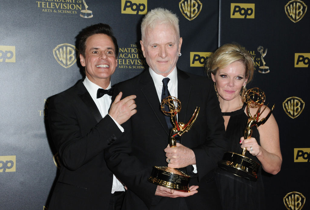FILE - Christian Jules Le Blanc, left, poses with Anthony Geary and Maura West, right, winners of the awards for outstanding lead actor and actress in a drama series for "General Hospital", at the 42nd annual Daytime Emmy Awards at Warner Bros. Studios, April 26, 2015, in Burbank, Calif. (Photo by Richard Shotwell/Invision/AP, File)